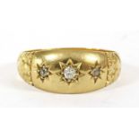 A Victorian 18ct gold three stone diamond ring,