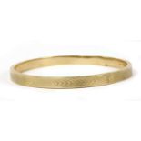 A 9ct gold hollow bangle,
