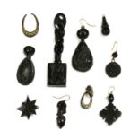 A quantity of carved jet jewellery,