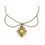 A gilt metal citrine pendant,