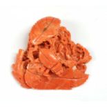 An unmounted carved coral,