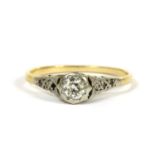 A gold single stone diamond ring,