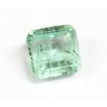 An unmounted emerald cut green beryl,