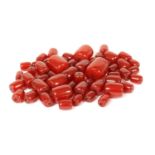 A quantity of graduated cherry coloured barrel shaped Bakelite beads,