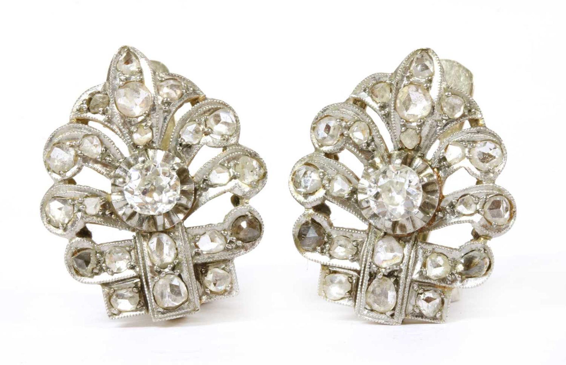 A pair of Continental silver and gold diamond set earrings,