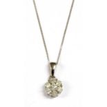 A white gold diamond daisy cluster pendant,