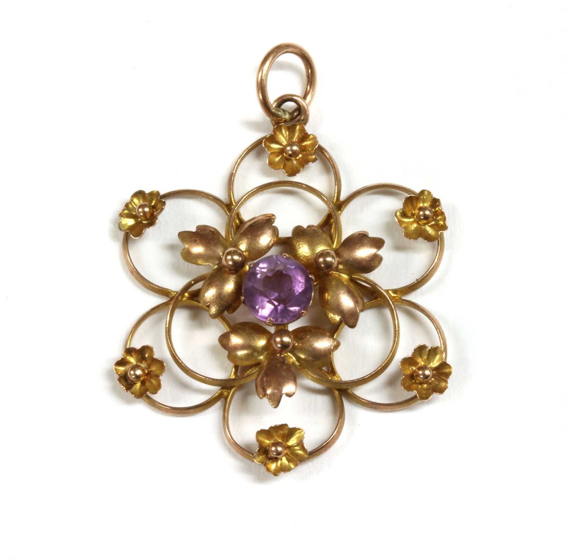 An Edwardian gold amethyst pendant,