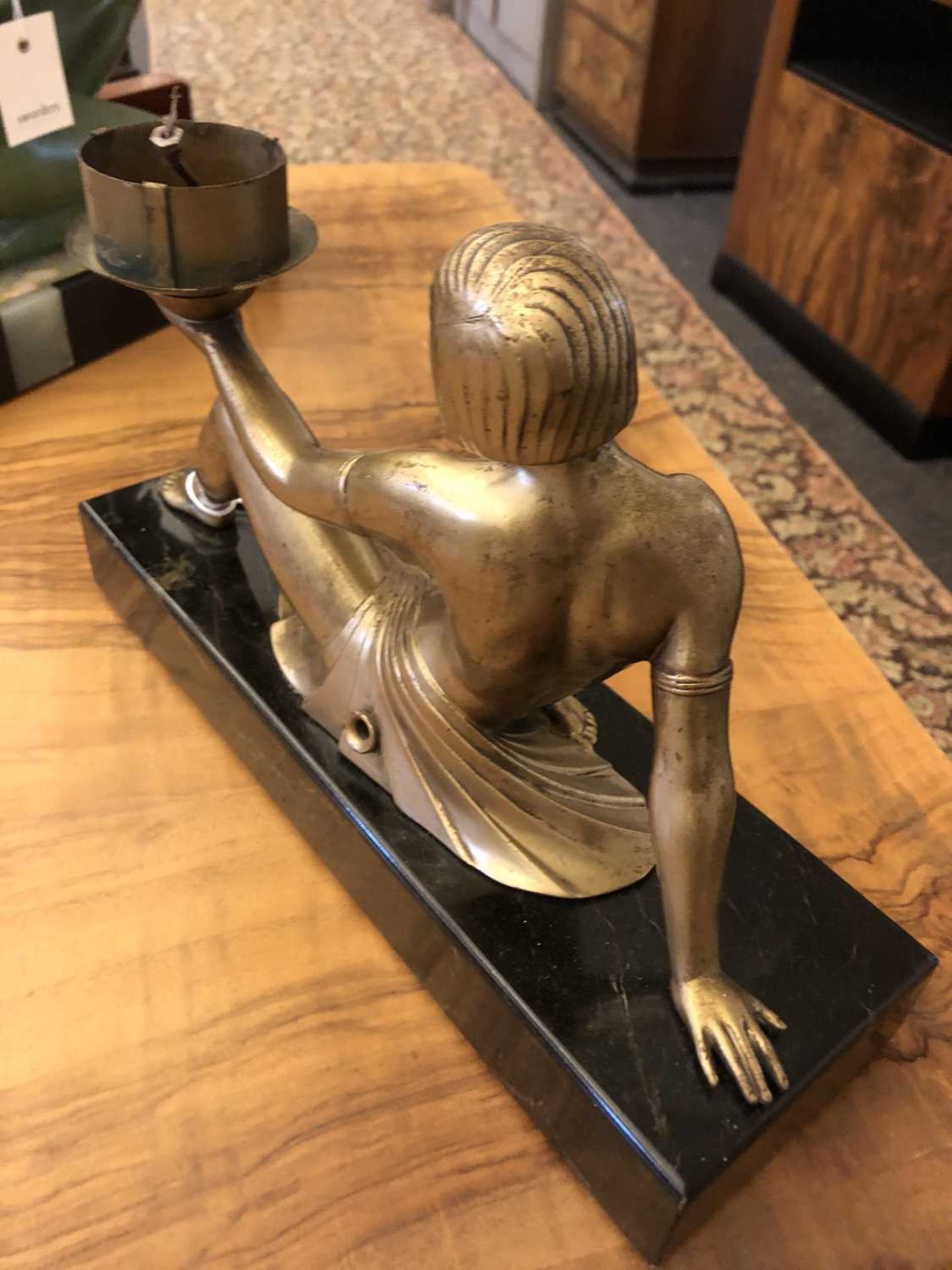 An Art Deco patinated spelter figure of a girl, - Image 9 of 16