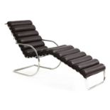 A reclining tubular lounger,