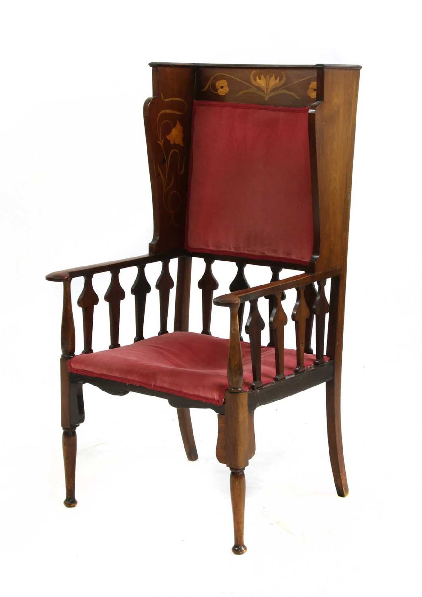 A mahogany inlaid wingback armchair,