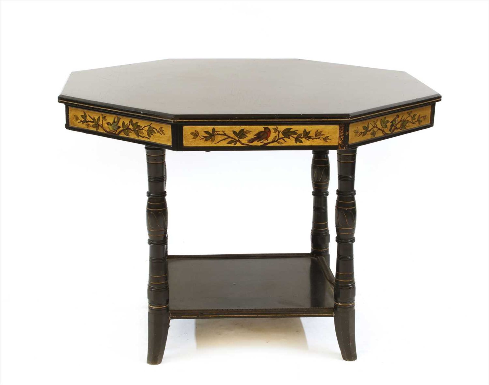 An Aesthetic octagonal ebonised and gilt centre table,