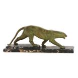 An Art Deco patinated spelter figure of a panther,