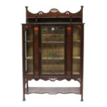 A mahogany Art Nouveau glazed display cabinet,
