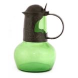 A Tudric pewter and green glass claret jug and cover,