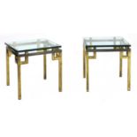 A pair of brass side tables,