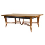 An Art Deco maple draw-leaf dining table,