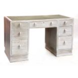 A limed oak desk,