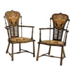 A pair of Art Nouveau mahogany and beech armchairs,