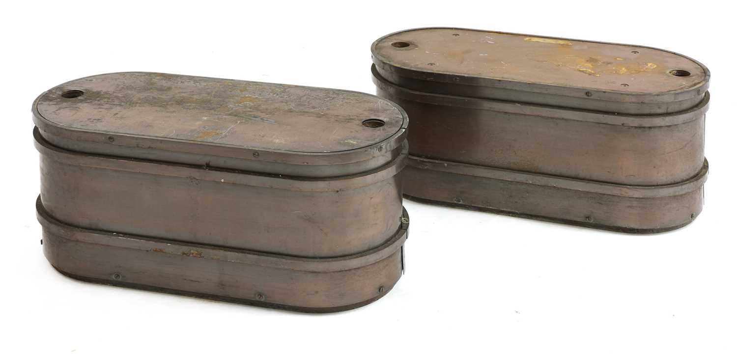 A pair of bronzed steel planters/plinths,