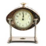 An Arts and Crafts silver-plated desk clock,