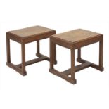 Two walnut stools or tables,