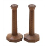 A pair of oak table lamps,