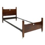 An Arts and Crafts mahogany single bed,