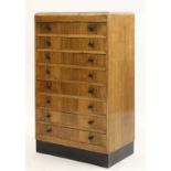 An Art Deco walnut chest of drawers,