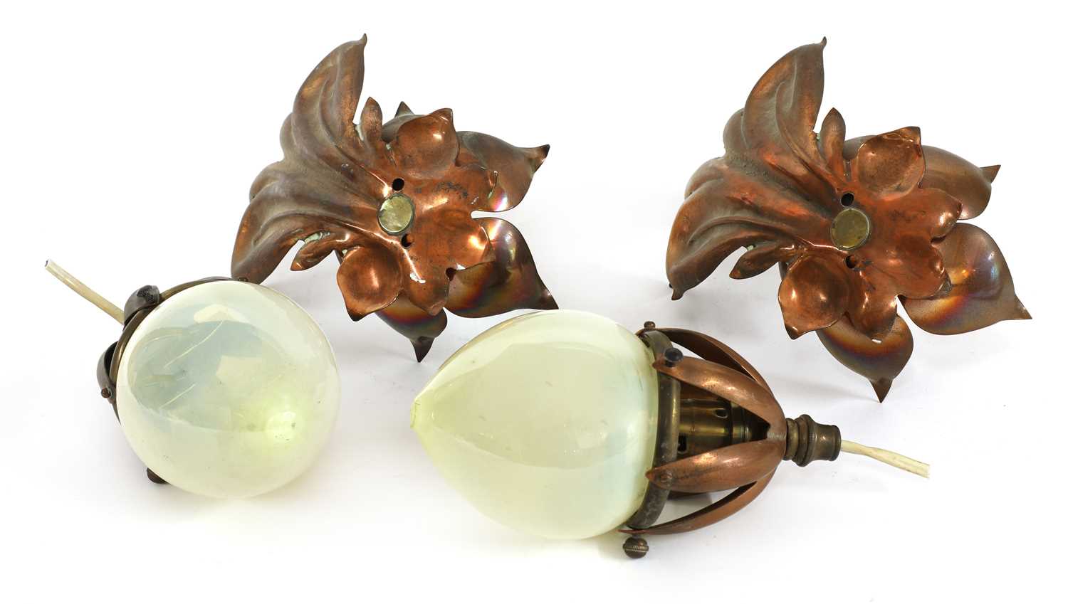 A pair of copper and brass hanging lights,