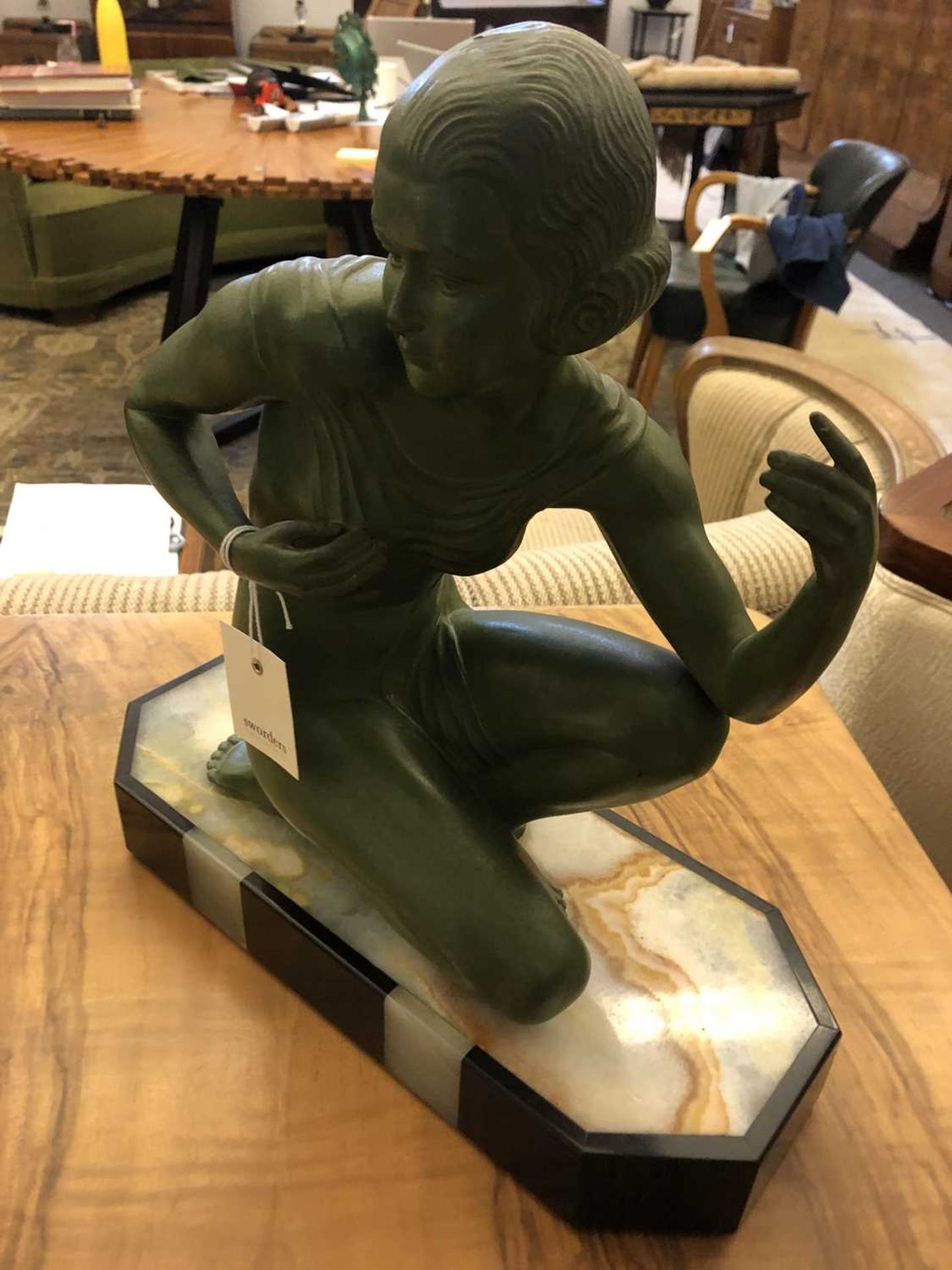 An Art Deco patinated spelter figure of a girl, - Image 12 of 16