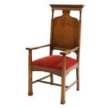 An Arts and Crafts oak-framed throne armchair,