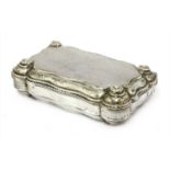 A silver cigarette box,