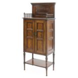 A walnut cabinet,