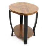 An Art Deco walnut and ebonised lamp table,