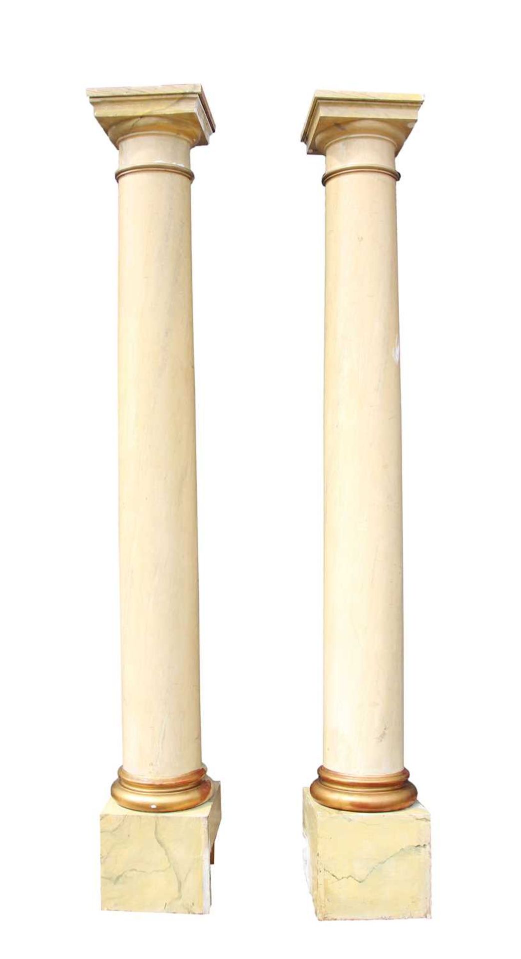 A pair of painted faux marble Ionic columns,