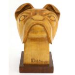 An Art Deco wooded sculpture of a bulldog head,