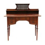 A Liberty & Co. walnut desk,