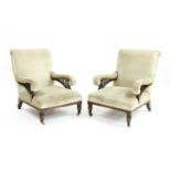 A pair of walnut armchairs,