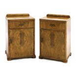 A pair of Art Deco walnut bedside cabinets,