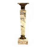 A marble and gilt bronze pedestal,