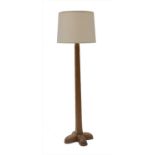 An oak standard lamp,