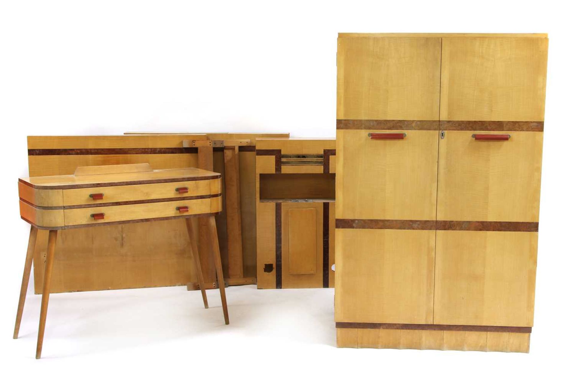 A maple and walnut suite of bedroom furniture,