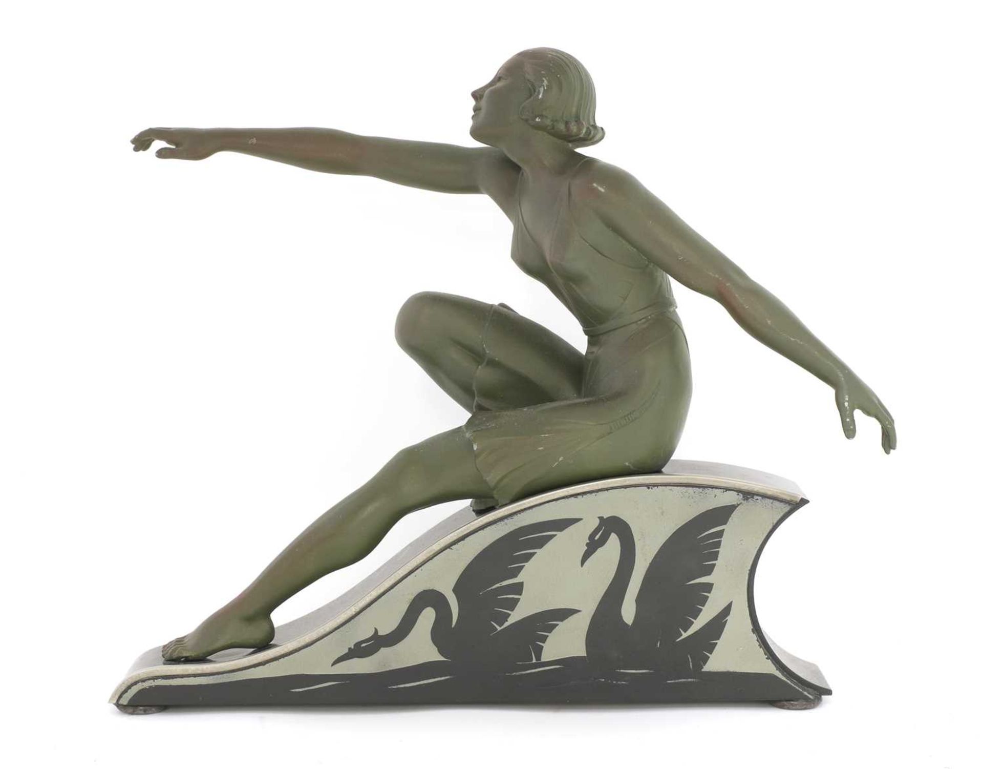 An Art Deco spelter figure of a lady,