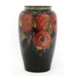 A William Moorcroft tubeline decorated 'Pomegranate' vase,