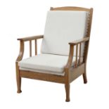 A Swedish Arts and Crafts oak lounger chair,