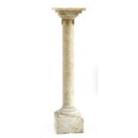 A marble column with gilt mounts,