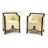 A pair of Art Deco-style armchairs,