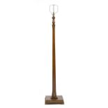 An Art Deco walnut standard lamp,