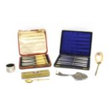 A cased set of silver teaknives,