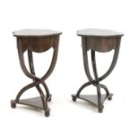 A pair of shaped topside tables,